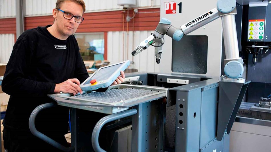 Man infront of collaborative robot solution